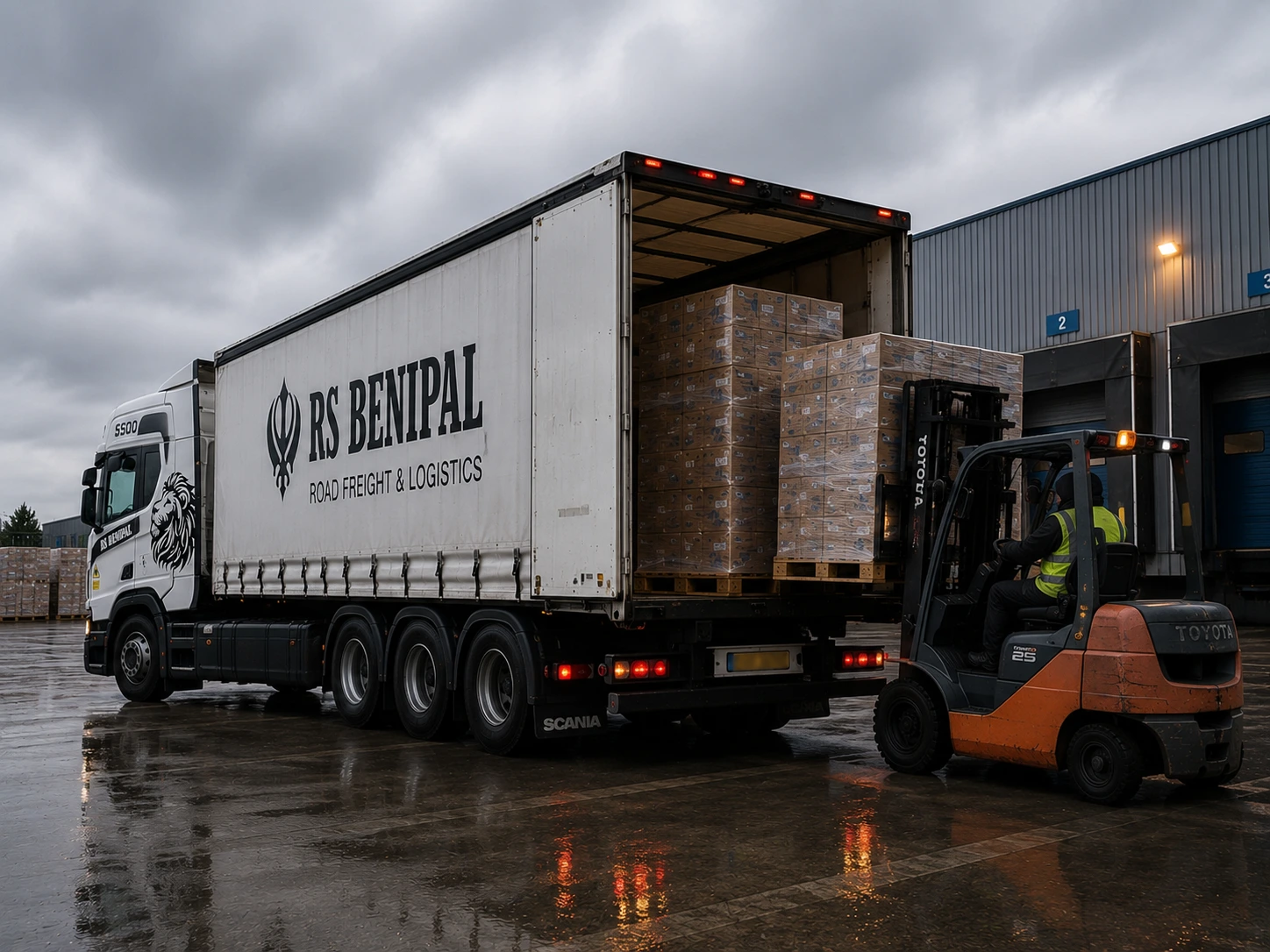 Forklift loading palletised freight